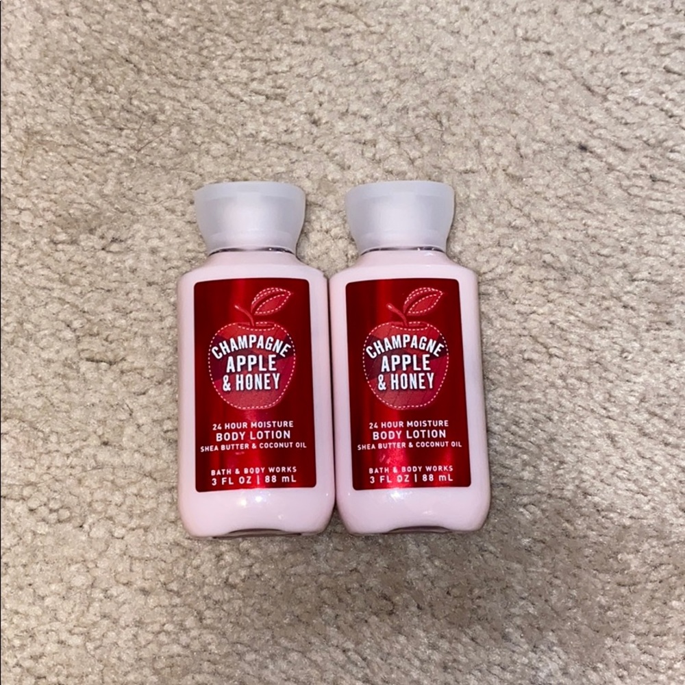 Two champagne apple and honey mini body lotions
